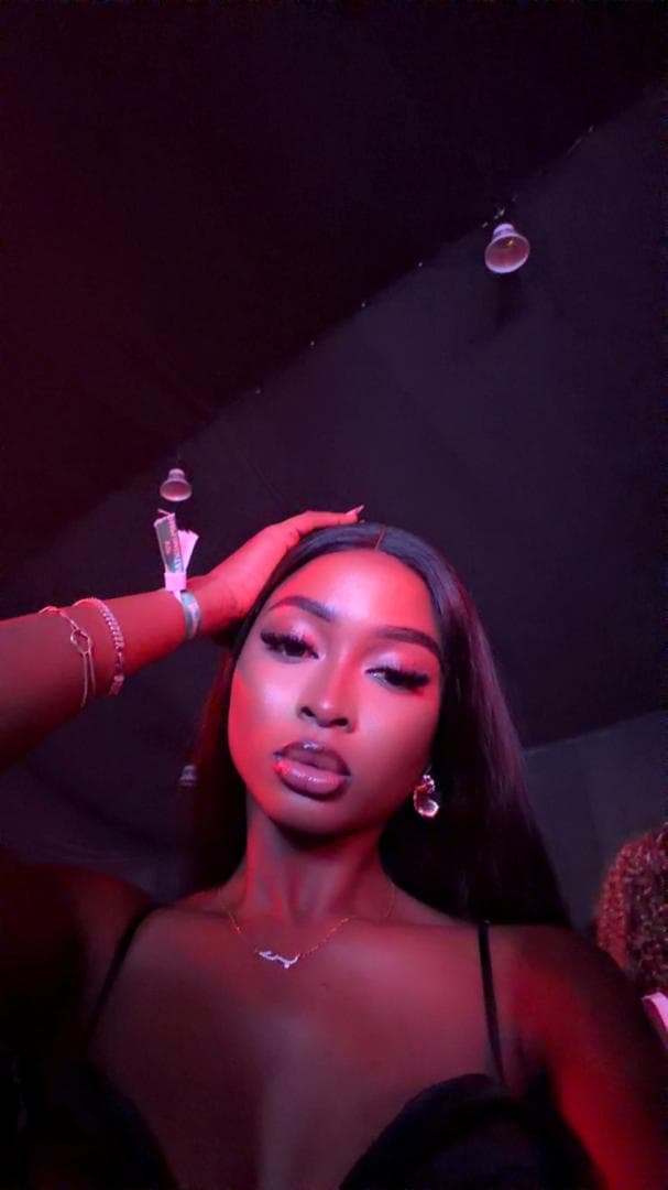Akua wearing a soft nude glossy lip combo