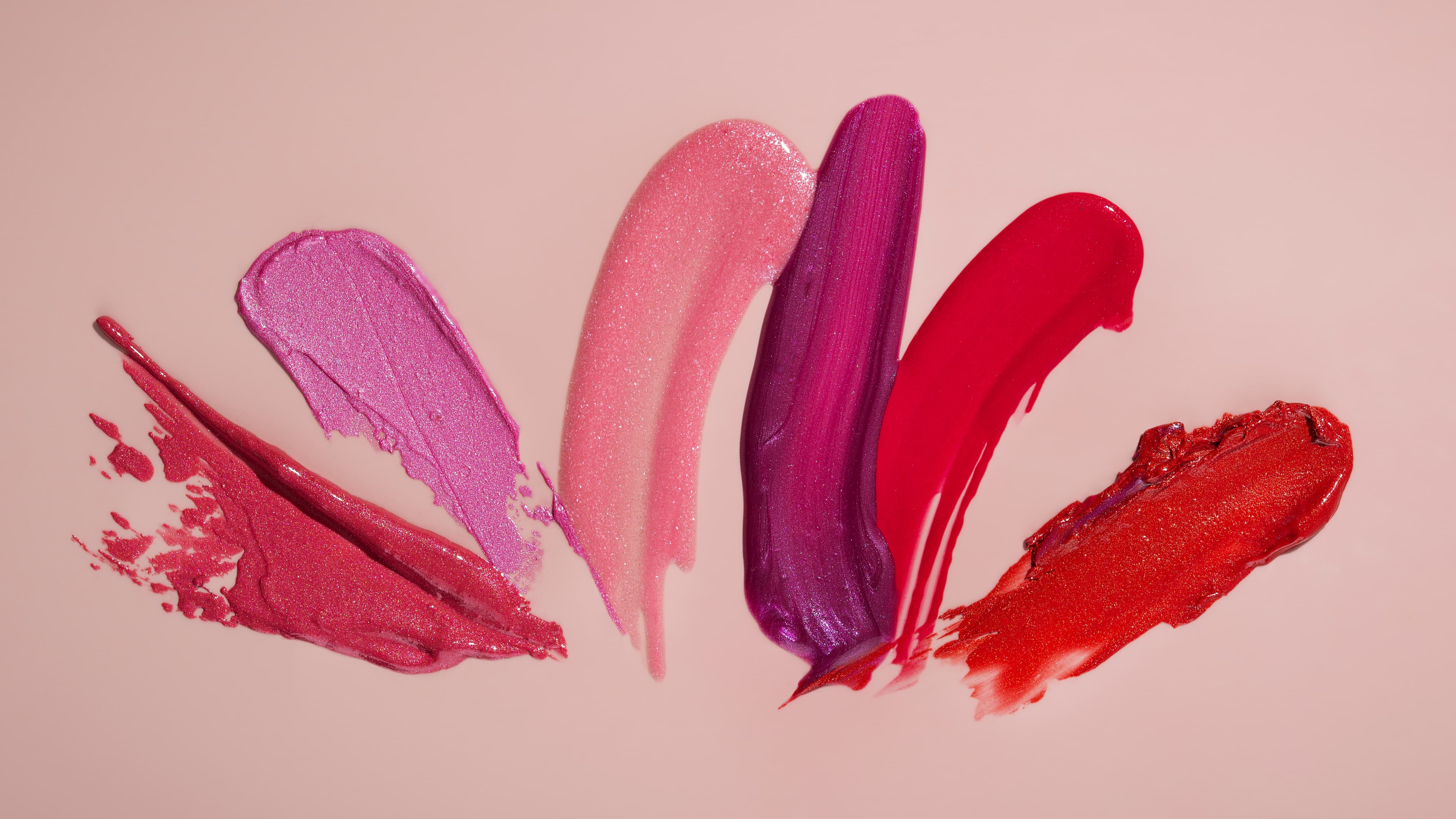 RnC Cosmetics makeup products arranged for a polished editorial look